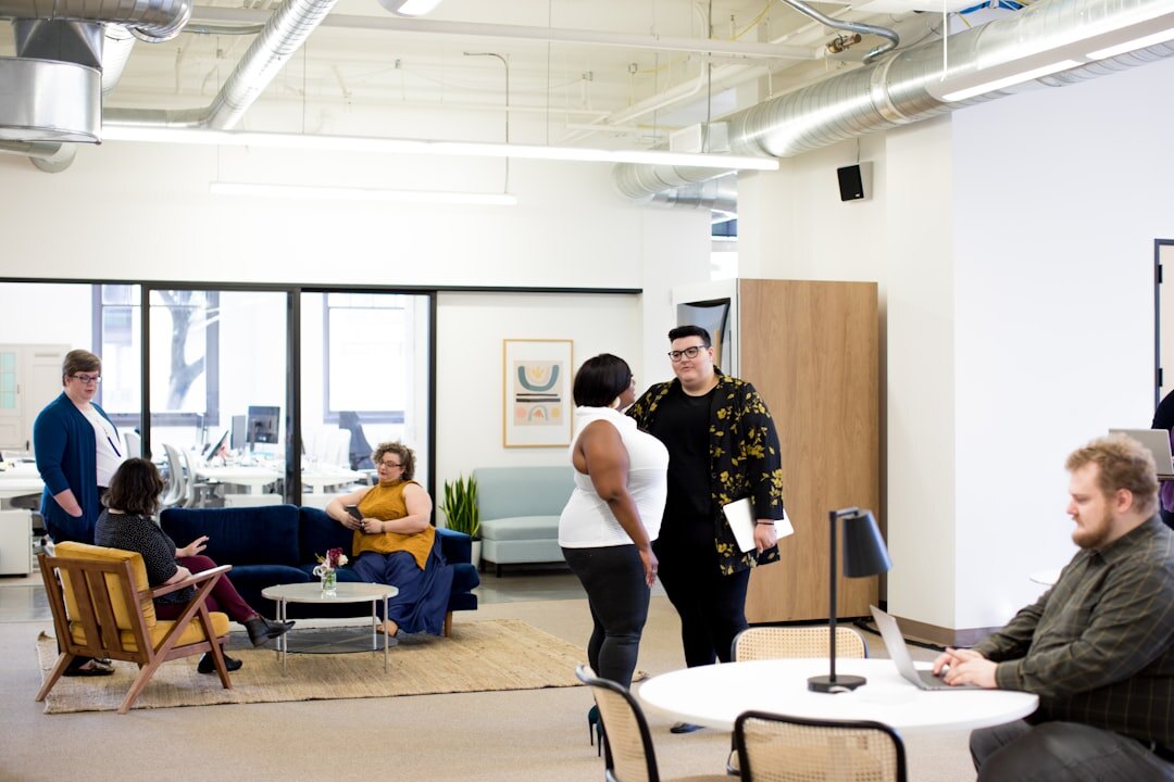 Team meeting in a modern office with professionals collaborating
